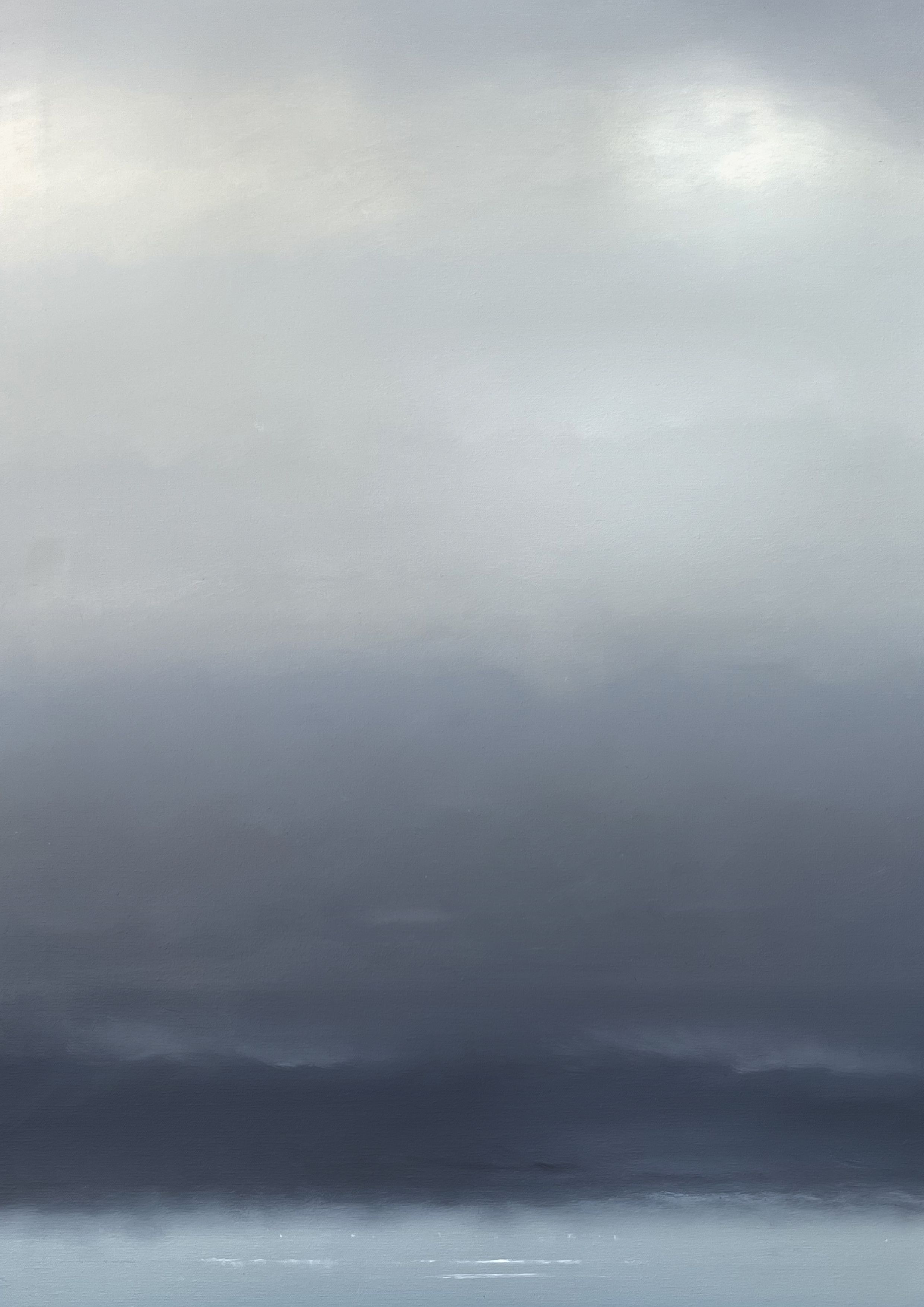 Lumière et brume au-dessus d'un horizon marin